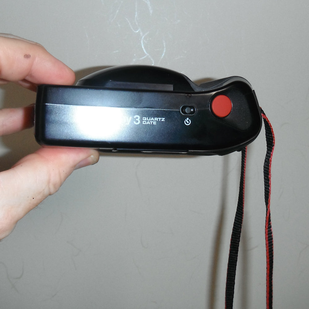 Top view showing shutter button and self-timer indicator