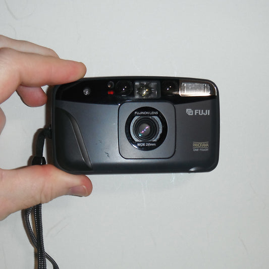 Front view of the Fuji Cardia Mini OP film camera showing lens and branding