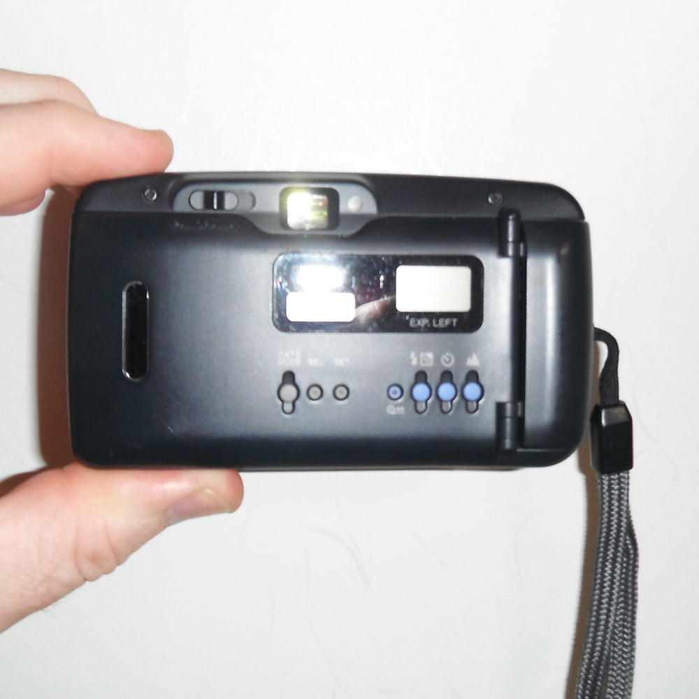 Rear view showing the film compartment and viewfinder