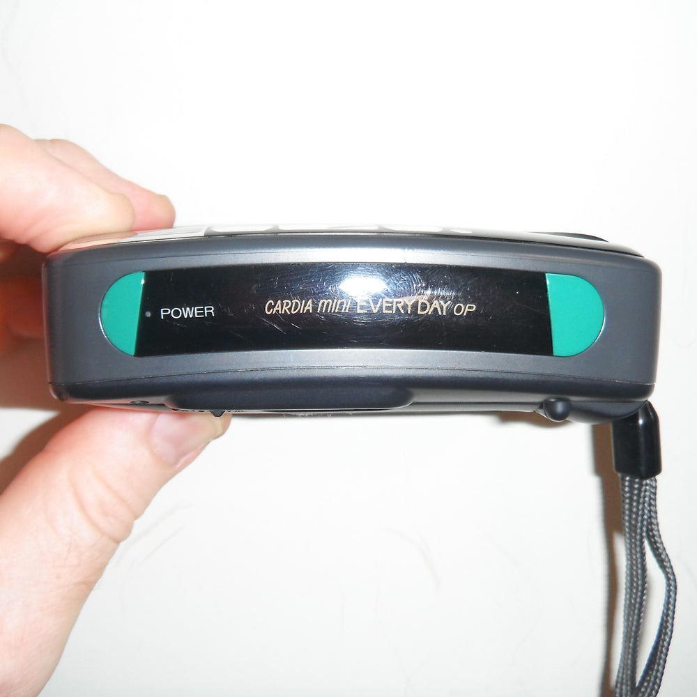 Camera held in hand to show scale and size