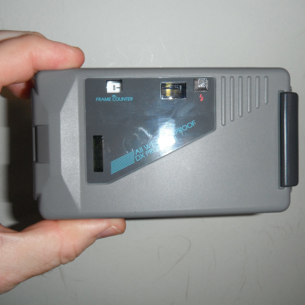 Back of Chinon Splash AF showing controls and film door